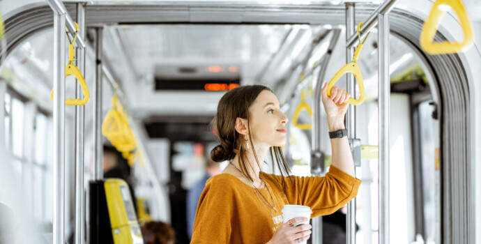 Female passenger using public transport