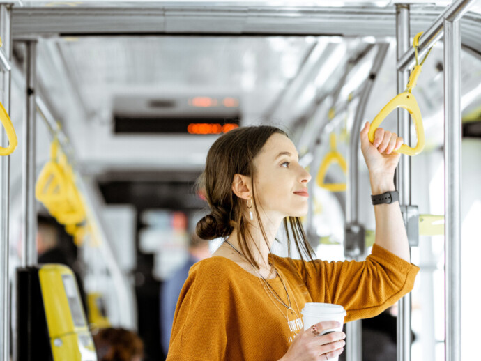 Female passenger using public transport