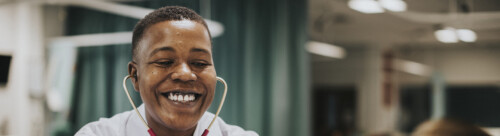 Doctor doing a checkup on a hospitalized patient