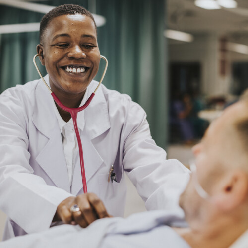 Doctor doing a checkup on a hospitalized patient