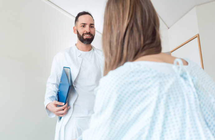 Doctor seeing patient in hospital