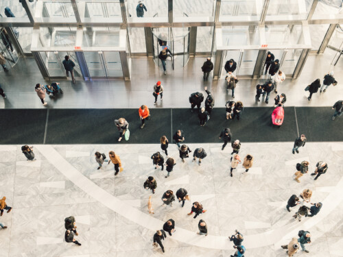 People crowd walking in the business centre and shopping mall en