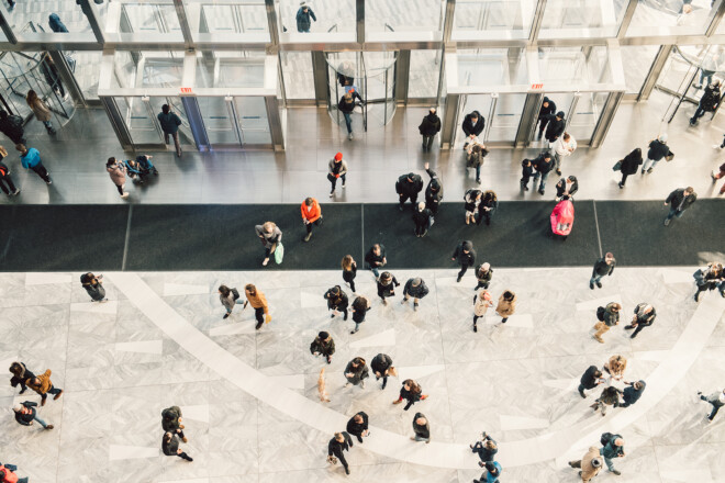 People crowd walking in the business centre and shopping mall en