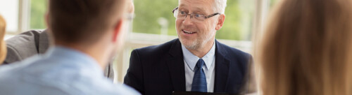 business people with laptop meeting in office