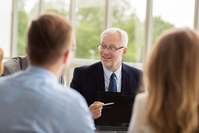 business people with laptop meeting in office