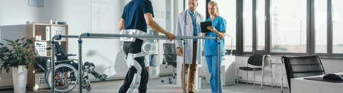 Modern Hospital Physical Therapy: Patient with Injury Walks on T