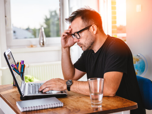 Creative man working at computer