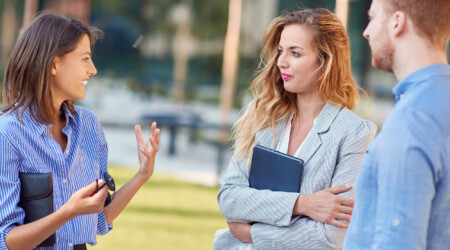 Young, urban and modern colleagues chatting