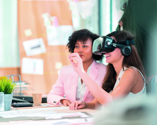 group of millennial male and female multiethnic using vr goggle