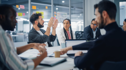 Multi-Ethnic Office Conference Room Meeting: Diverse Team of Cre