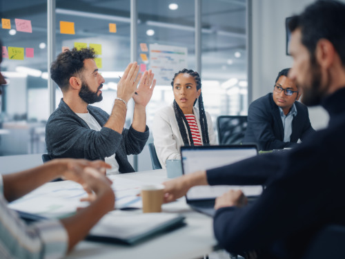 Multi-Ethnic Office Conference Room Meeting: Diverse Team of Cre