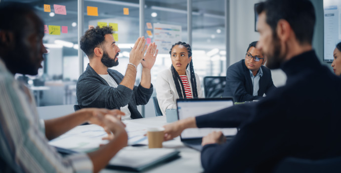 Multi-Ethnic Office Conference Room Meeting: Diverse Team of Cre