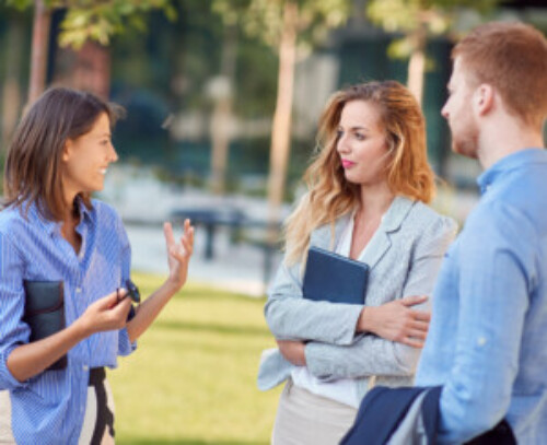 Young, urban and modern colleagues chatting