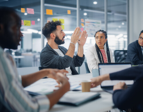 Multi-Ethnic Office Conference Room Meeting: Diverse Team of Cre