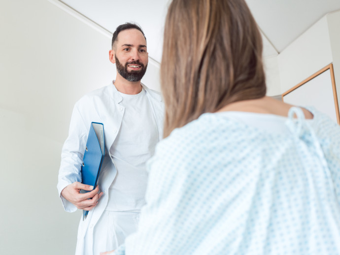 Doctor seeing patient in hospital