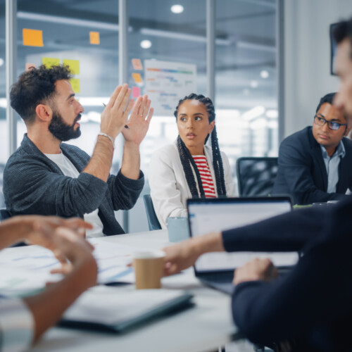 Multi-Ethnic Office Conference Room Meeting: Diverse Team of Cre