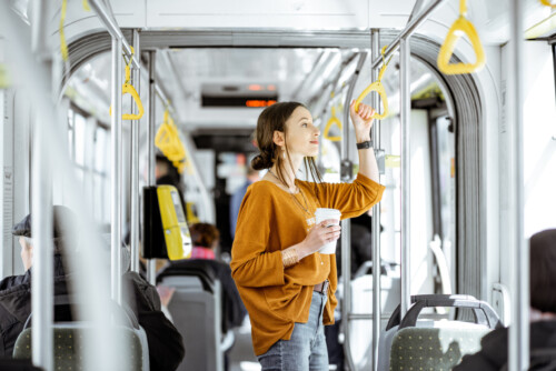 Female passenger using public transport