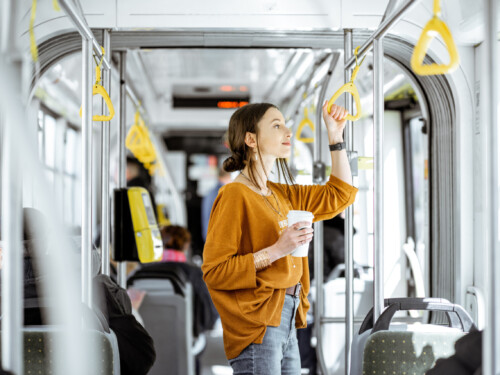 Female passenger using public transport